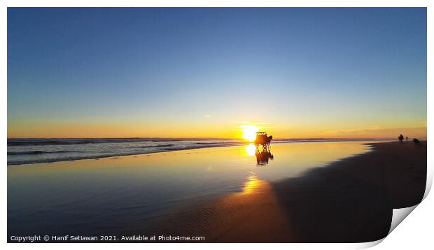 Silhouetted horse-drawn carriage beach sunset 5 Print by Hanif Setiawan