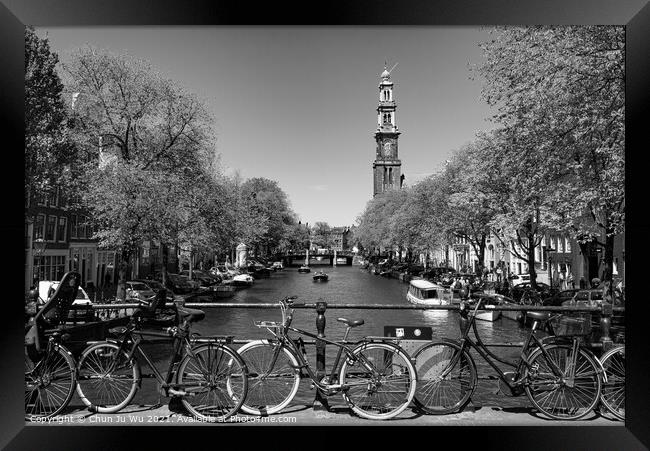 Bikes on the bridge that crosses the canal in Amsterdam, Netherlands (black & white) Framed Print by Chun Ju Wu