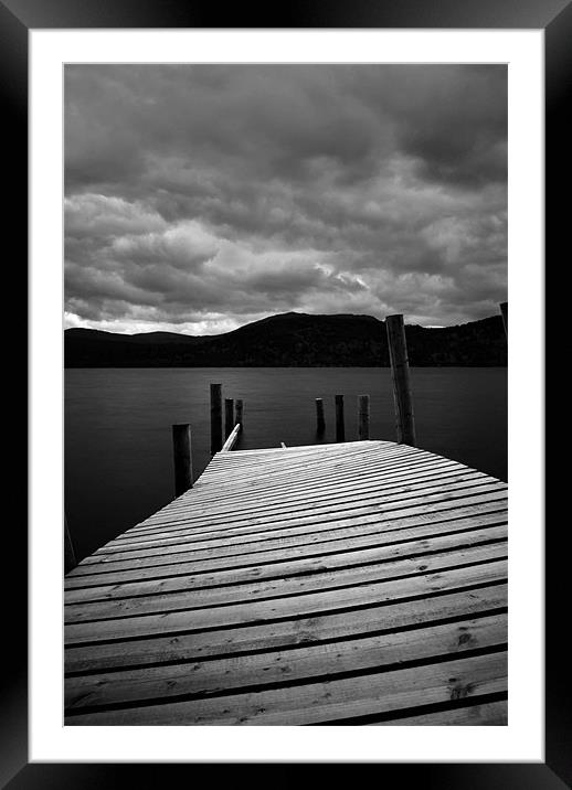 Jetty over water Framed Mounted Print by Kraig Phillips