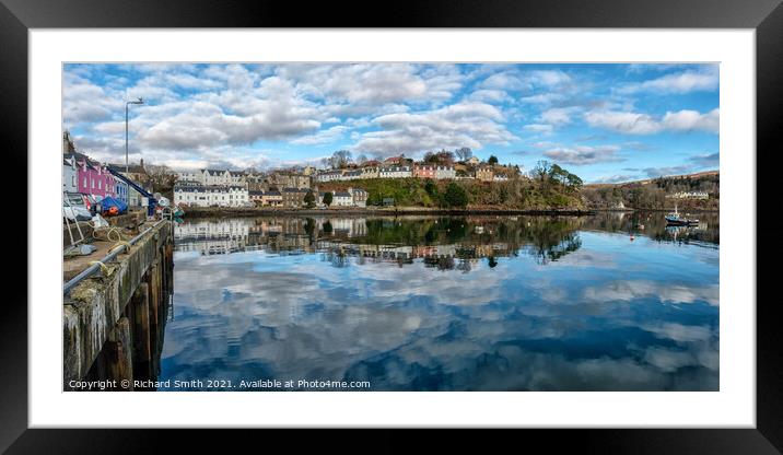 The town of Portree surrounds the harbour with reflections of the sky. Framed Mounted Print by Richard Smith