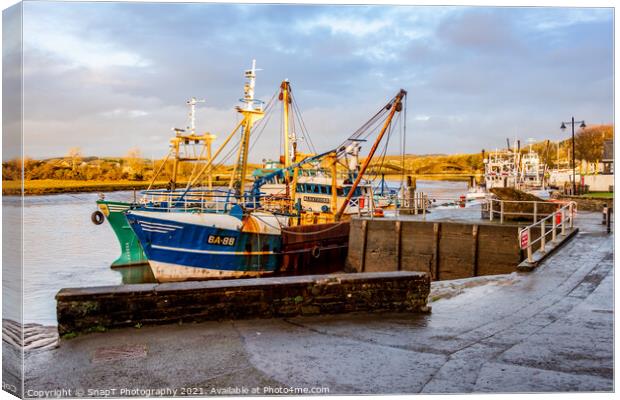 Fishing trawlers moored at Kirkcudbright harbour on the River Dee at sunset Canvas Print by SnapT Photography