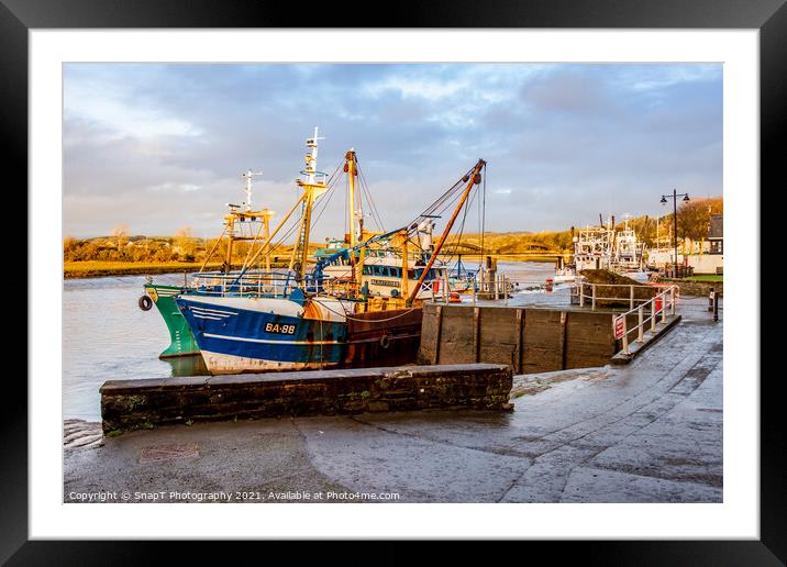 Fishing trawlers moored at Kirkcudbright harbour on the River Dee at sunset Framed Mounted Print by SnapT Photography