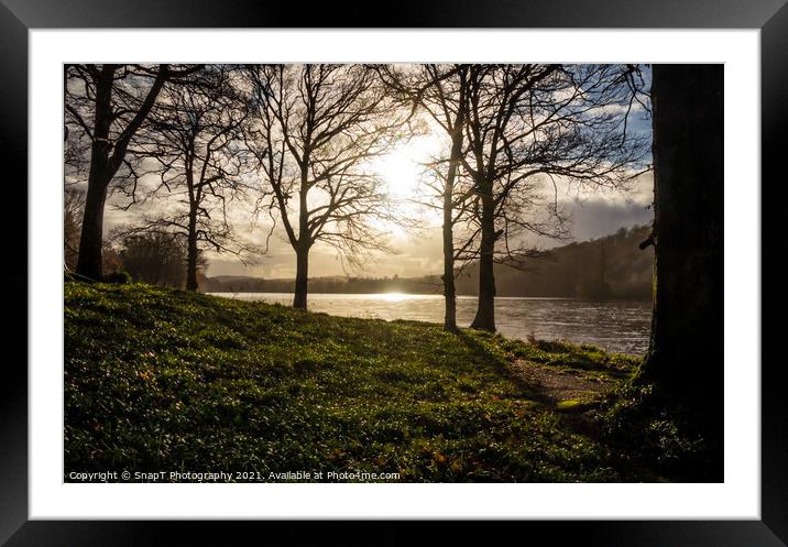 Winter sun breaking through the trees on Loch Ken, a Scottish Loch in Galloway Framed Mounted Print by SnapT Photography