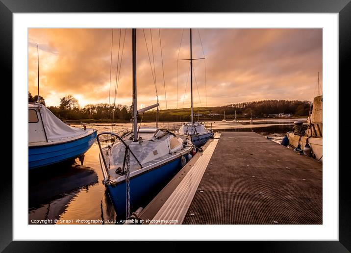 Yachts moored at Kirkcudbright marina at sunset in winter on the Dee estuary Framed Mounted Print by SnapT Photography