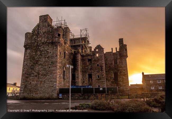 MacLellan's Castle at sunset on the old High Street in Kirkcudbright, Scotland Framed Print by SnapT Photography