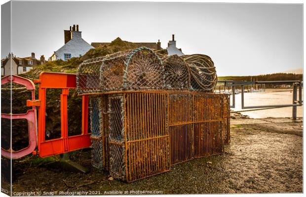 Lobster and prawn fishing pots and creels stacked up at Kirkcudbright Harbour Canvas Print by SnapT Photography