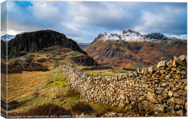 Langdale Wall in the Lake District. Canvas Print by John Henderson