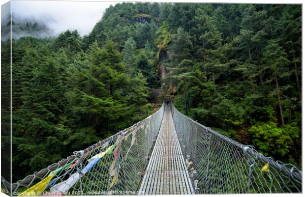 Suspension Bridge at Himalayan area in Nepal Canvas Print by Chun Ju Wu