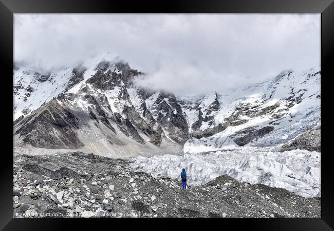 A man standing in front of the glacier at Himalayas mountain range in Nepal Framed Print by Chun Ju Wu