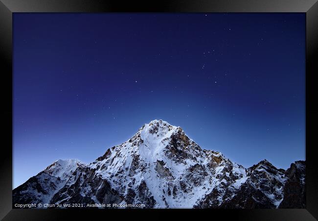 Snow mountains and starry sky at Himalayan area in Nepal Framed Print by Chun Ju Wu
