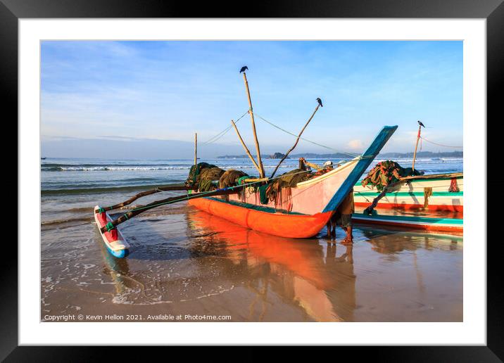 Traditional fishing boat on beach Framed Mounted Print by Kevin Hellon