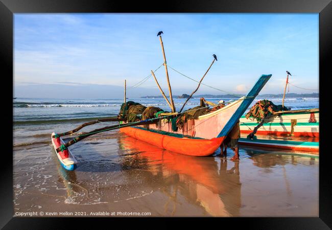 Traditional fishing boat on beach Framed Print by Kevin Hellon
