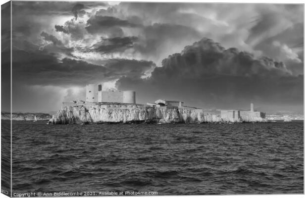 The Chateau d'If  under stormy skys in monochrome Canvas Print by Ann Biddlecombe