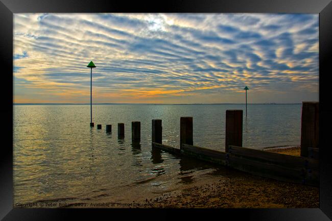 Unusual evening cloud formation at Westcliff on Sea, Essex, UK. Framed Print by Peter Bolton
