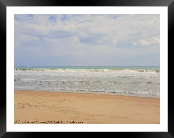 Sand beach wavy sea and cloud sky 1c Framed Mounted Print by Hanif Setiawan