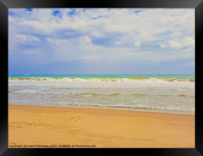 Sand beach wavy sea and cloud sky 1d Framed Print by Hanif Setiawan