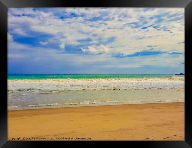 Sand beach wavy sea and cloud sky 2b Framed Print by Hanif Setiawan