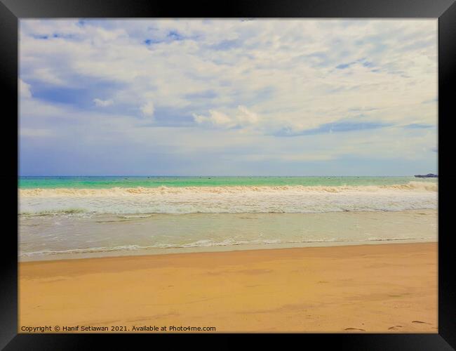 Sand beach wavy sea and cloud sky 2d Framed Print by Hanif Setiawan