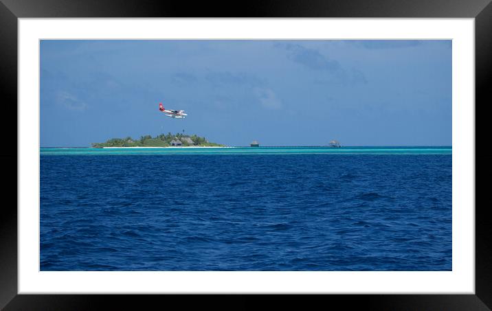 Maldives Islands with sea plane landing Framed Mounted Print by mark humpage