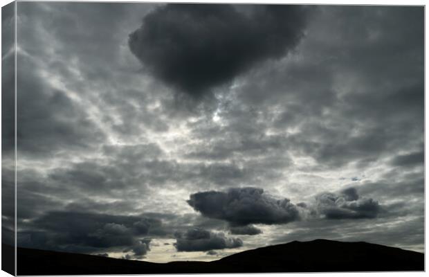 Clouds over Sale Fell in the Lake District. Canvas Print by Peter Wiseman