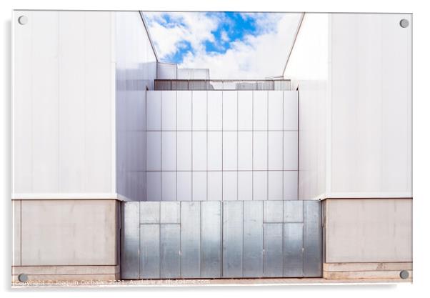 Facade of a door of an industrial warehouse made of gleaming alu Acrylic by Joaquin Corbalan