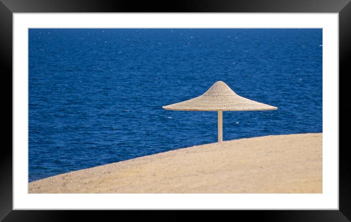 Beach sand sea and parasol Egypt Framed Mounted Print by mark humpage