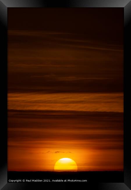 The setting sun Framed Print by Paul Madden