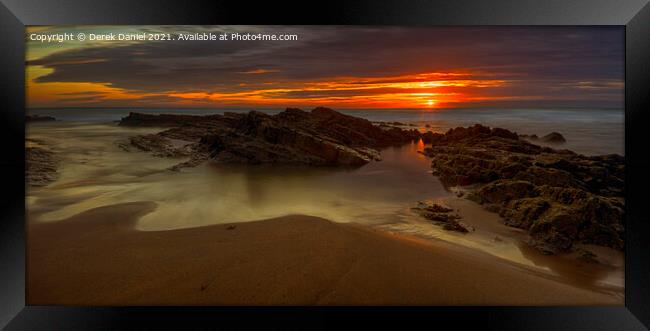 Colourful Sunset over Crooklets Beach Framed Print by Derek Daniel