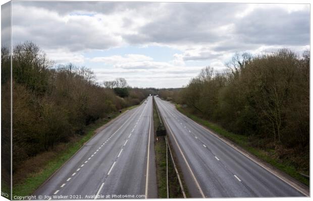 An empty road during the Coronavirus lockdown.  Canvas Print by Joy Walker