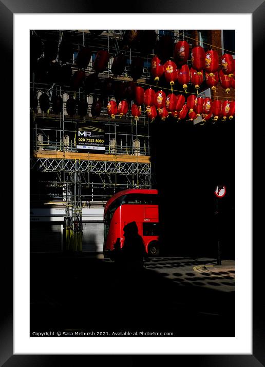 Red bus and lanterns Framed Mounted Print by Sara Melhuish