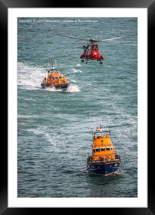Lifeboats with the rescue helicopter on stormy sea Framed Mounted Print by kathy white