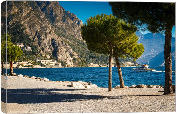 Limone Sul Garda - Beach view with boat Canvas Print by Jonathan Campbell