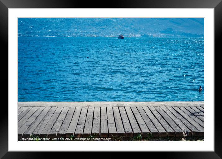 Limone Sul Garda - Lake view and pier Framed Mounted Print by Jonathan Campbell