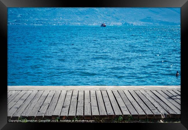 Limone Sul Garda - Lake view and pier Framed Print by Jonathan Campbell