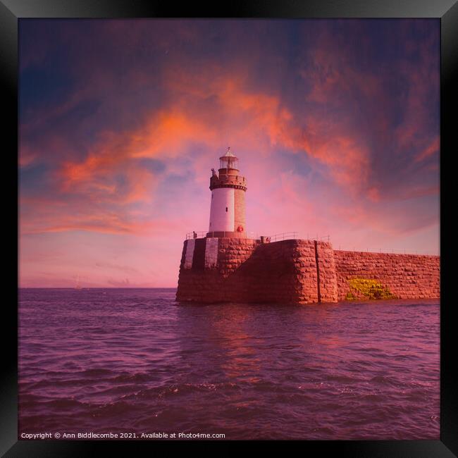 Guernsey Lighthouse from the sea Framed Print by Ann Biddlecombe