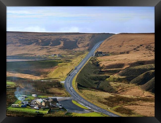 Road over the moors Framed Print by Roy Hinchliffe