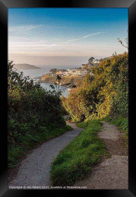 Coast path at Looe in the early morning light with  Looe island  Framed Print by Jim Peters