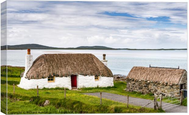 A Thatched Cottage on the Banks of Traigh Vallay on North Uist Canvas Print by Richard Burdon