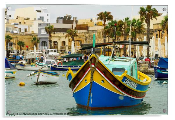 A small boats moored in marsaxlokk bay Acrylic by Christopher Kelly