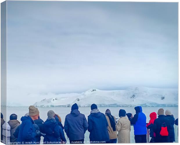 a group of people watching glacier in Antarctica Canvas Print by Anish Punchayil Sukumaran