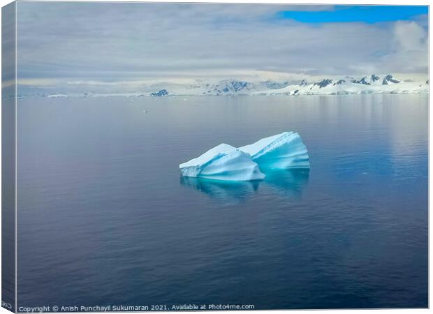 floating iceberg in north pole and frozen mountain Canvas Print by Anish Punchayil Sukumaran