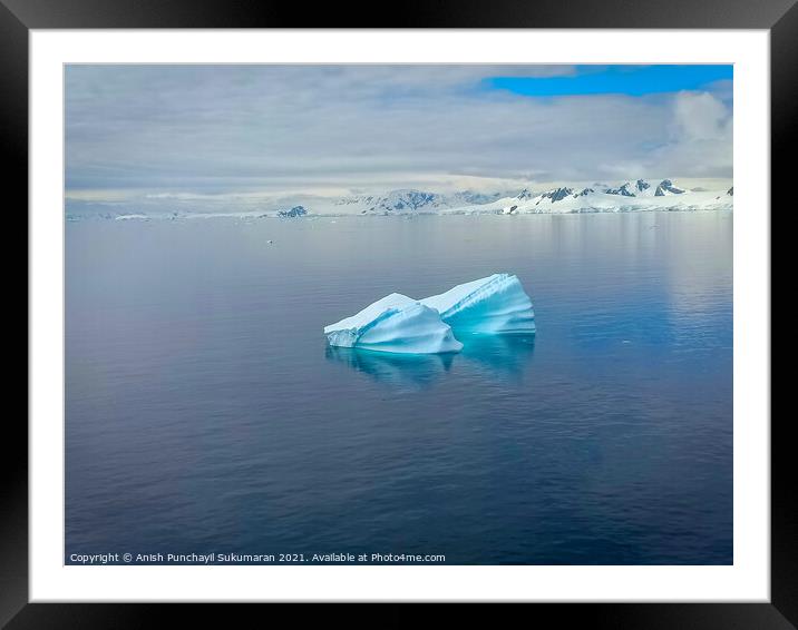floating iceberg in north pole and frozen mountain Framed Mounted Print by Anish Punchayil Sukumaran
