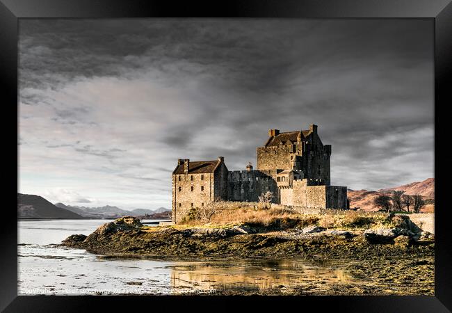 Winters Day At Eilean Donan Castle In The Scottish Highlands Framed Print by Peter Greenway