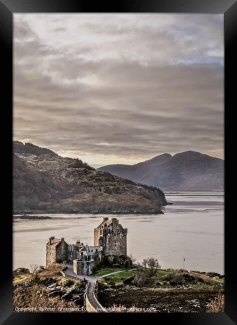 Eilean Donan Castle in the Scottish Highlands From The Hills Framed Print by Peter Greenway