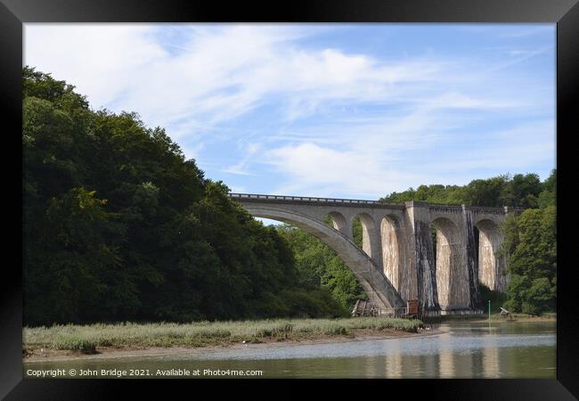A Viaduct across the River Rance at Dinan Framed Print by John Bridge