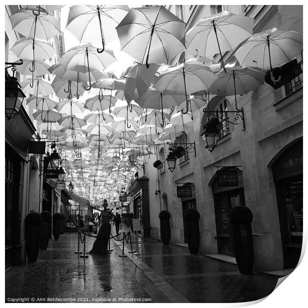 Umbrella street in Paris in black and white Print by Ann Biddlecombe