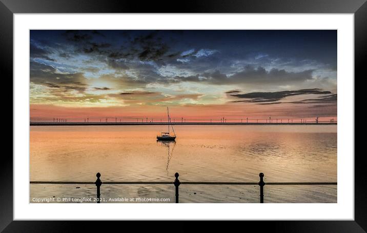 The lone boat at sunset.  Framed Mounted Print by Phil Longfoot
