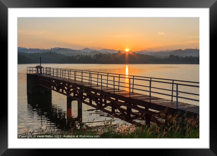 Sunrise over pier Framed Mounted Print by Kevin Hellon