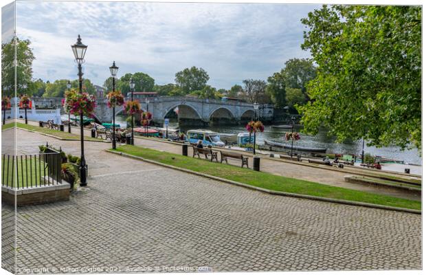 Richmond waterfront with River Thames and Richmond Bridge in the background Canvas Print by Milton Cogheil