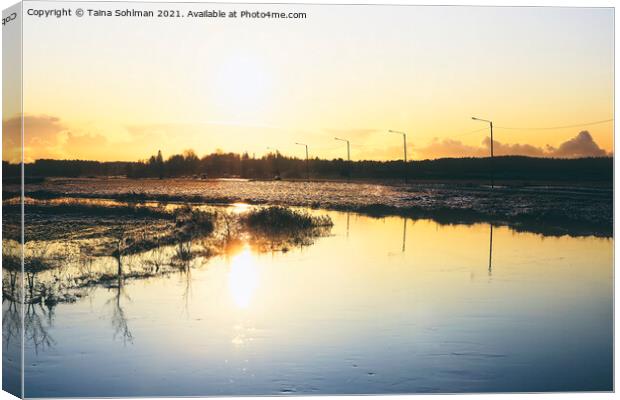 Sunset Over Flooded River Canvas Print by Taina Sohlman